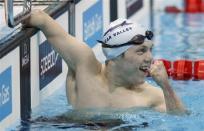 Lyndon Longhorne reacts after breaking the British record for his S4 class and securing his qualification for the 2012 London Paralympics after the multi classification men's 150m individual medley final at the British Gas Swimming Championships 2012 at the Olympic Aquatics Centre in London March 8, 2012. Longhorne was the only competitor and was racing against the clock to secure his qualification.