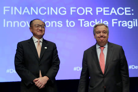 United Nations Secretary General Antonio Guterres (R) and World Bank President Jim Yong Kim attend Financing for Peace: Innovations to Tackle Fragility session during the IMF/World Bank spring meetings in Washington, U.S., April 21, 2017. REUTERS/Yuri Gripas