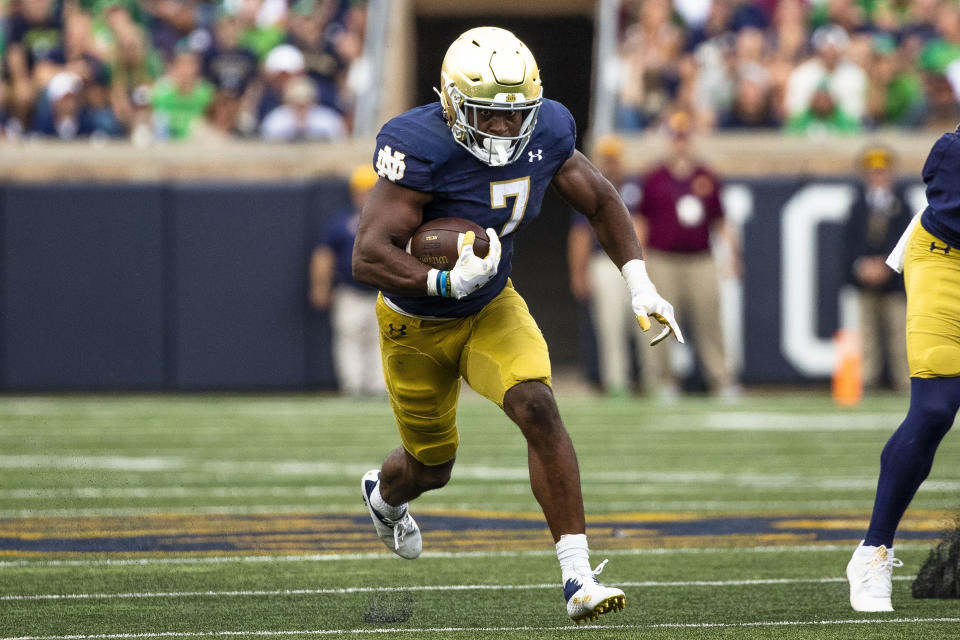 Notre Dame's Audric Estimé (7) will try to lead the Irish rushing attack against Louisville on Saturday. (AP Photo/Michael Caterina)