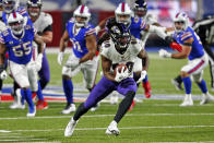 Baltimore Ravens wide receiver Miles Boykin (80) runs after making a catch during the first half of an NFL divisional round football game against the Buffalo Bills Saturday, Jan. 16, 2021, in Orchard Park, N.Y. (AP Photo/Jeffrey T. Barnes)