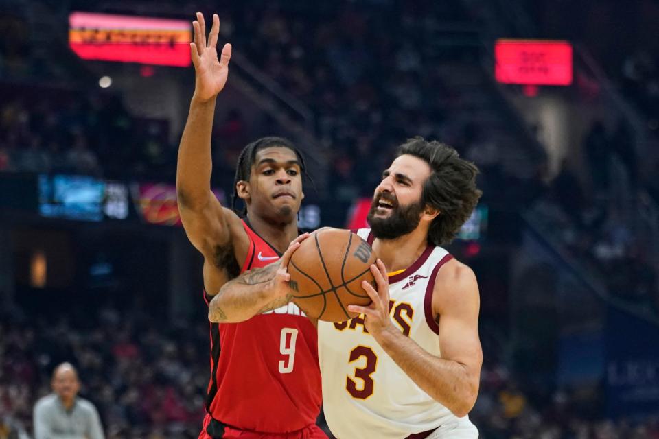 Cleveland Cavaliers' Ricky Rubio (3) drives against Houston Rockets' Josh Christopher (9) in the first half of an NBA basketball game, Wednesday, Dec. 15, 2021, in Cleveland. (AP Photo/Tony Dejak)