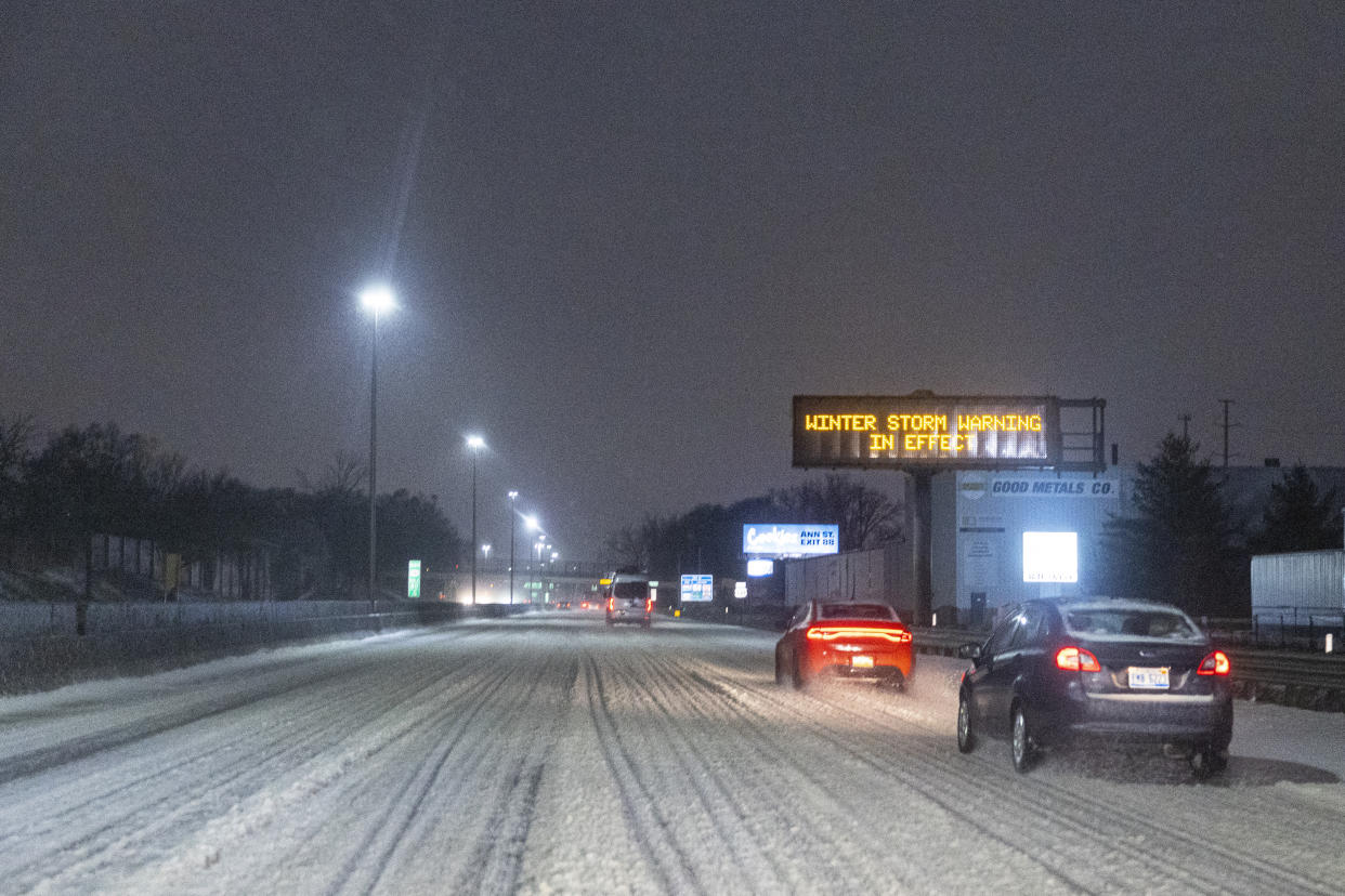 Vehicles drive north along U.S. 131 during a winter storm warning in Grand Rapids, Mich., on Wednesday, Feb. 22, 2023. (Joel Bissell/MLive.com/Kalamazoo Gazette via AP)