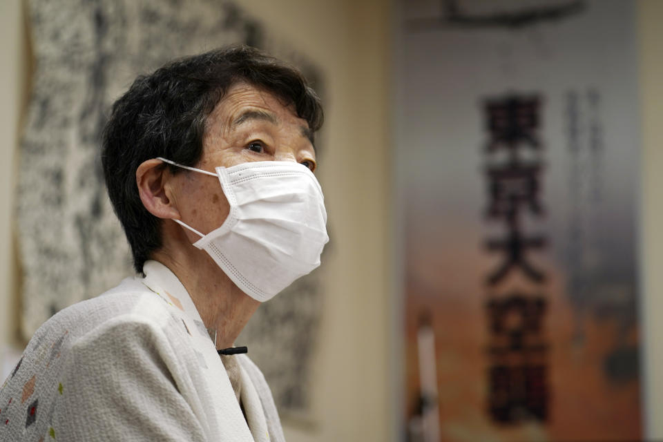 Mitsuyo Hoshino, 86, who lost her parents and siblings to the Great Tokyo Air Raid on March 10, 1945, speaks on her experience during an interview with the Associated Press at the Center for the Tokyo Raids and War Damage in Tokyo Tuesday, July 28, 2020. In Japan, war orphans were punished for surviving. They were bullied. They were called trash, sometimes rounded up by police and put in cages. Some were sent to institutions or sold for labor. They were targets of abuse and discrimination. Now, 75 years after the war's end, some are revealing their untold stories of recovery and pain, underscoring Japan’s failure to help its own people. (AP Photo/Eugene Hoshiko)