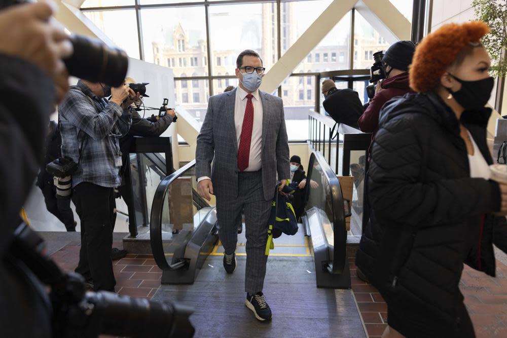Jeff Storms, attorney for Daunte Wright, arrives at the Hennepin County Government Center in Minneapolis Wednesday, Dec. 8, 2021, as opening statements begin in the trial for former suburban Minneapolis police officer Kim Potter. (AP Photo/Christian Monterrosa)