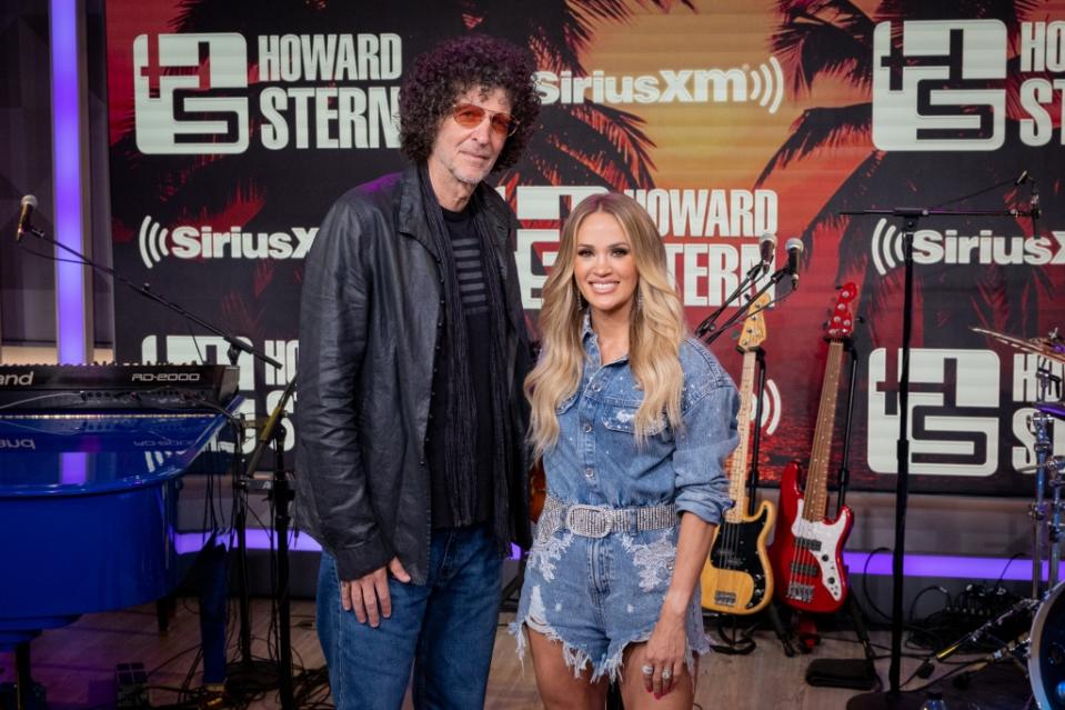 MIAMI BEACH, FLORIDA - MAY 03: Howard Stern and Carrie Underwood pose at The Howard Stern Show at the SiriusXM Miami studios on May 03, 2023 in Miami Beach, Florida. (Photo by Emma McIntyre/Getty Images for SiriusXM)