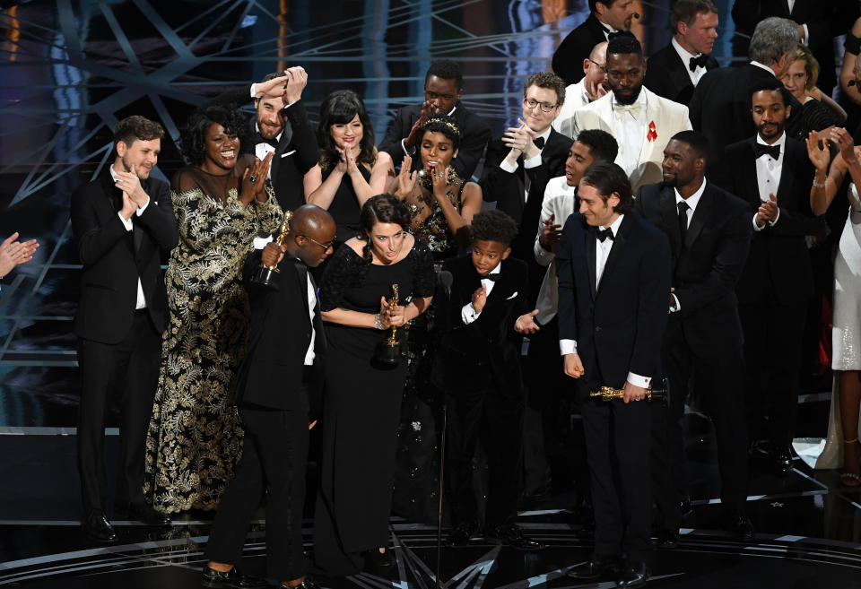 The cast and crew of Moonlight on stage at the Academy Awards