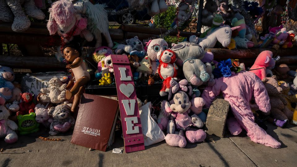 A memorial for Aniya Allen lay on the ground of the corner store near where she was shot in north Minneapolis. - Andrea Ellen Reed for CNN