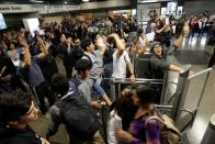 Demonstrators protest against the increase in the subway ticket prices in Santiago