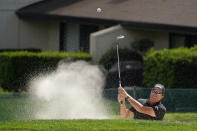 Phil Mickelson follow his shot out of a bunker up to the second green of the Silverado Resort North Course during the final round of the Fortinet Championship PGA golf tournament Sunday, Sept. 19, 2021, in Napa, Calif. (AP Photo/Eric Risberg)