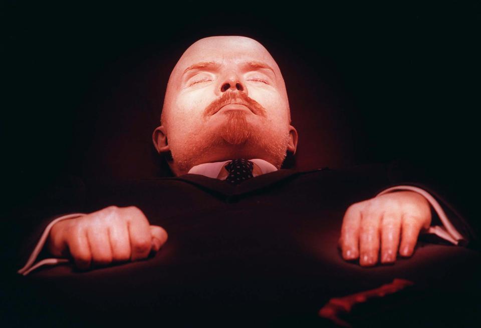 This April 16, 1997 file photo shows Vladimir Lenin, founder of the Soviet Union, embalmed in his tomb on Moscow's Red Square. Two decades after the Soviet Union collapsed, a visit to its founder is more about creepy kitsch than political pilgrimage, but still a potent view into the totalitarian psyche. Open 10 a.m.-1 p.m. Tuesday-Thursday and Saturday-Sunday. Entrance is free, but bags, cameras and phones must be checked for a fee. To make this a true freebie, go with a companion who can hold your gear and then switch off. The line moves briskly and the tag-team method won't eat up much extra time.(AP Photo/Sergei Karpukhin)