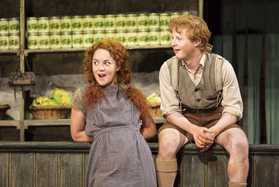 This image released by Boneau/Bryan-Brown shows Sarah Greene, left, and Conor MacNeill performing in "The Cripple of Inishmaan," opening April 20 at the Cort Theatre in New York. (AP Photo/Boneau/Bryan-Brown, Johan Persson)