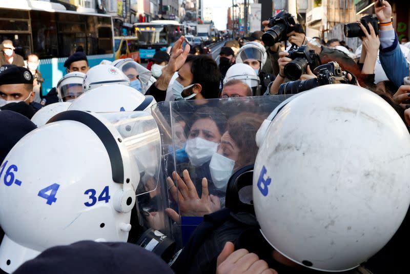 People attend a demonstration in Istanbul