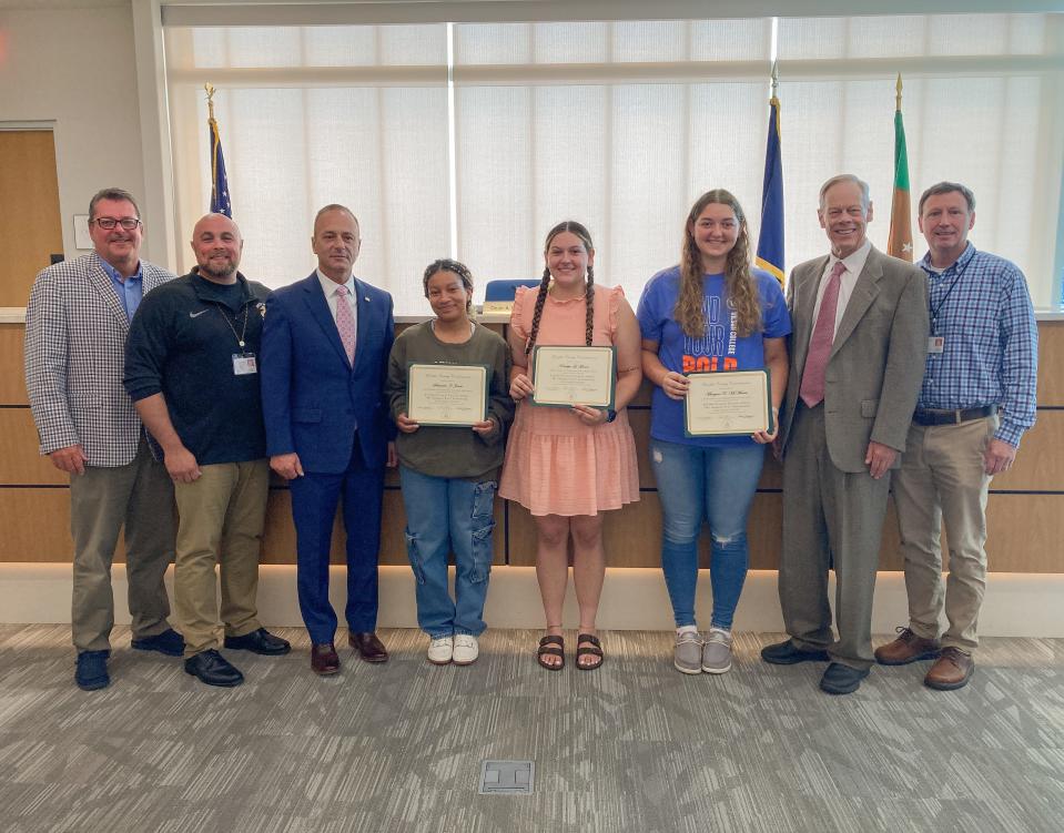 Pictured (from left): Franklin County Commissioner John Flannery; Veteran Affairs Director Justin Slep; Commissioner Chairman Dean Horst; scholarship winners Summer Jones, Katelyn Grace and Morgan McMaster; Commissioner Bob Ziobrowski; and Veteran Affairs Community Outreach Coordinator John McPaul