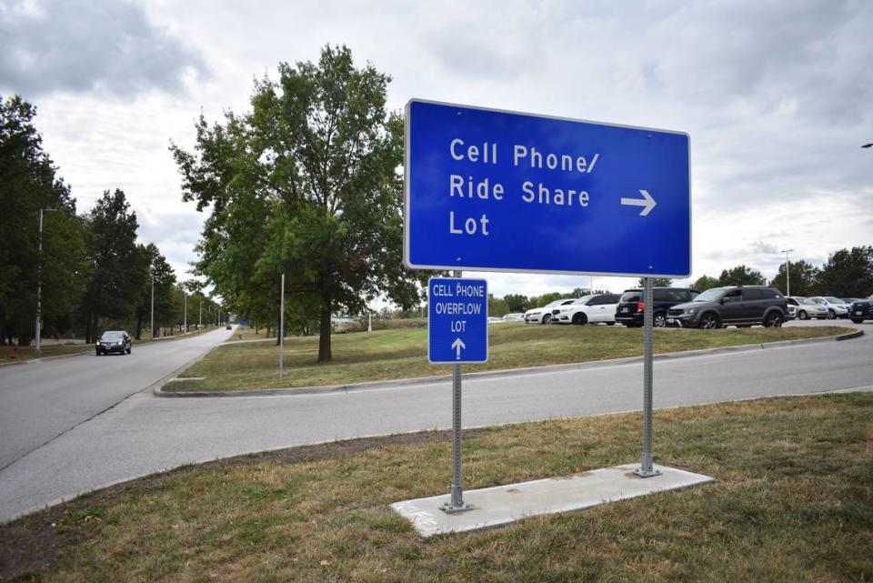 A sign marking the cellphone waiting lot at Kansas City International Airport is seen on Wednesday. The airport also has an overflow lot for drivers waiting to pick up travelers.