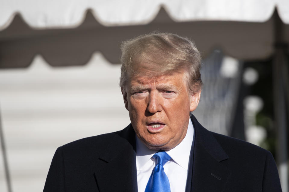 President Donald Trump speaks with reporters before boarding Marine One on the South Lawn of the White House, Saturday, Dec. 7, 2019, in Washington. (AP Photo/Alex Brandon)