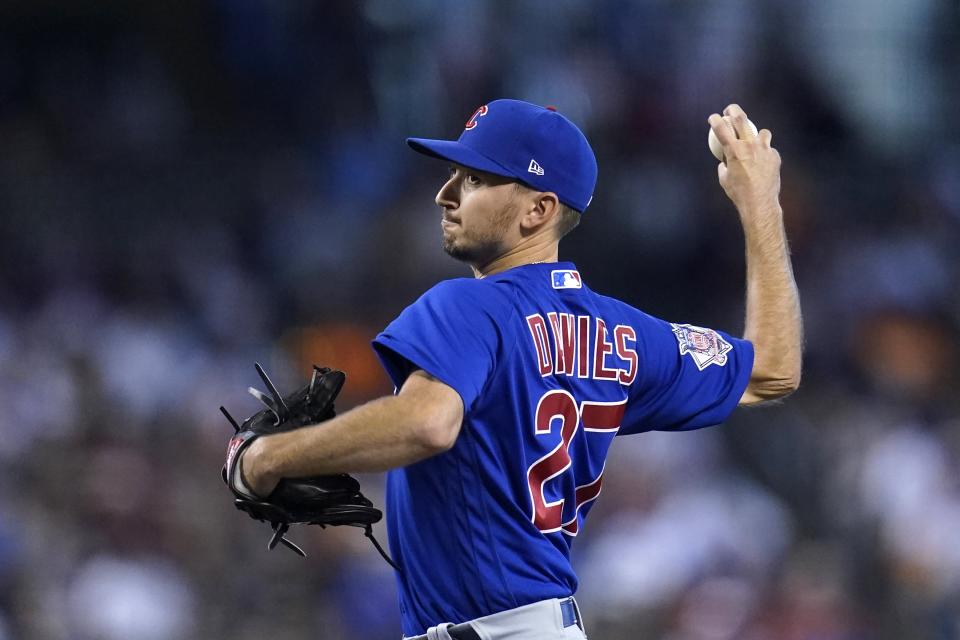 Chicago Cubs starting pitcher Zach Davies throws against the Arizona Diamondbacks during the first inning of a baseball game, Sunday, July 18, 2021, in Phoenix. (AP Photo/Ross D. Franklin)