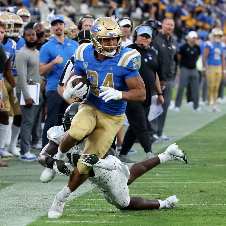 UCLA running back Zach Charbonnet runs in fourth quarter.