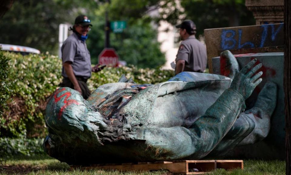 Statue of Confederate general Albert Pike after it was toppled and defaced near Judiciary Square the previous night following a day of Juneteenth celebrations in Washington DC, on 20 June.