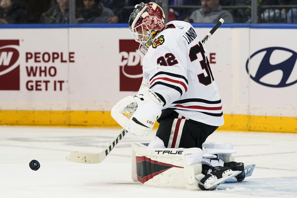 Chicago Blackhawks goaltender Kevin Lankinen makes a save against against the New York Rangers during the first period of an NHL hockey game Saturday, Dec. 4, 2021, at Madison Square Garden in New York. (AP Photo/Mary Altaffer)