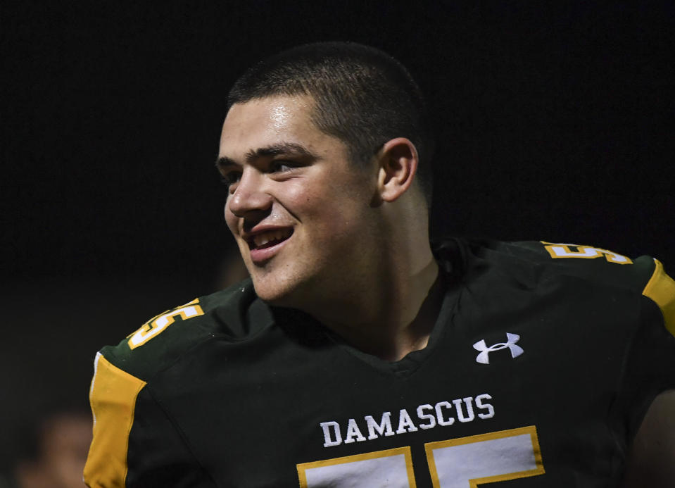 DAMASCUS, MD - SEPTEMBER 27:  Damascus Hornets Bryan Bresee (55) looks to the fans in the stands during the game on Friday, September 27, 2019. Damascus was playing it's first home game since last spring's administrative overhaul in the wake of a sexual assault scandal within the football program. (Photo by Toni L. Sandys/The Washington Post via Getty Images)