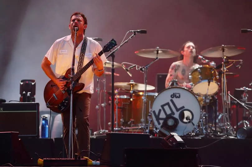 Nathan Followill and Caleb Followill of Kings of Leon perform at the Singapore Formula One Grand Prix