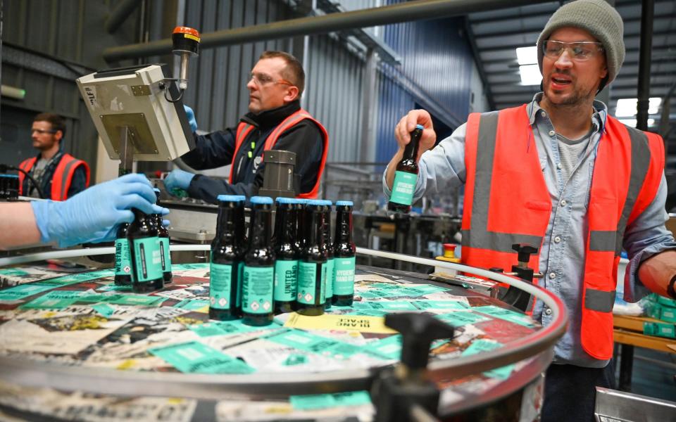 During the pandemic, BrewDog staff produced hand sanitiser to donate to UK charities and the NHS - Jeff J Mitchell/Getty Images