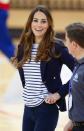 <p>This striped top is about as close to casual as Kate usually gets, and she wore this outfit (which she paired with wedge heels, btw) to play volleyball while at a SportsAid Athlete Workshop in 2013. </p>