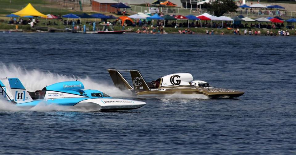 Driver Andrew Tate in the U-91 Goodman Real Estate unlimited hydroplane holds off hard charging Dylan Rumme in the U-1 Miss Homestreet Bank at the finish line to claim victory in Heat 3B of the Columbia Cup race on the Columbia River in the Tir-Cities. Bob Brawdy/bbrawdy@tricityherald.com