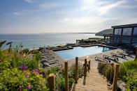 <p>If it’s good enough for world leaders, it’s good enough for us – <a href="https://www.booking.com/hotel/gb/carbis-bay-hotel.en-gb.html?aid=2200763&label=hotels-outdoor-pools" rel="nofollow noopener" target="_blank" data-ylk="slk:Carbis Bay;elm:context_link;itc:0;sec:content-canvas" class="link ">Carbis Bay</a> was where the G7 Summit was held in 2021. In addition to its admittedly rather attractive pool, it has a Blue Flag beach on its doorstep, a spa and 125 acres of grounds to explore. There are rooms in the main house and luxurious lodges by the beach. </p><p>The restaurant by the shore is the perfect place for sundowners and local seafood after days spent by the outdoor pool or on the sand. It’s also home to a restaurant by the acclaimed chef Adam Handling.</p><p><a class="link " href="https://www.booking.com/hotel/gb/carbis-bay-hotel.en-gb.html?aid=2200763&label=hotels-outdoor-pools" rel="nofollow noopener" target="_blank" data-ylk="slk:BOOK NOW;elm:context_link;itc:0;sec:content-canvas">BOOK NOW</a></p>