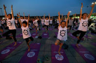 <p>Children perform yoga to mark the International Day of Yoga in Seoul, South Korea, Wednesday, June 21, 2017. (Photo: Ahn Young-joon/AP) </p>