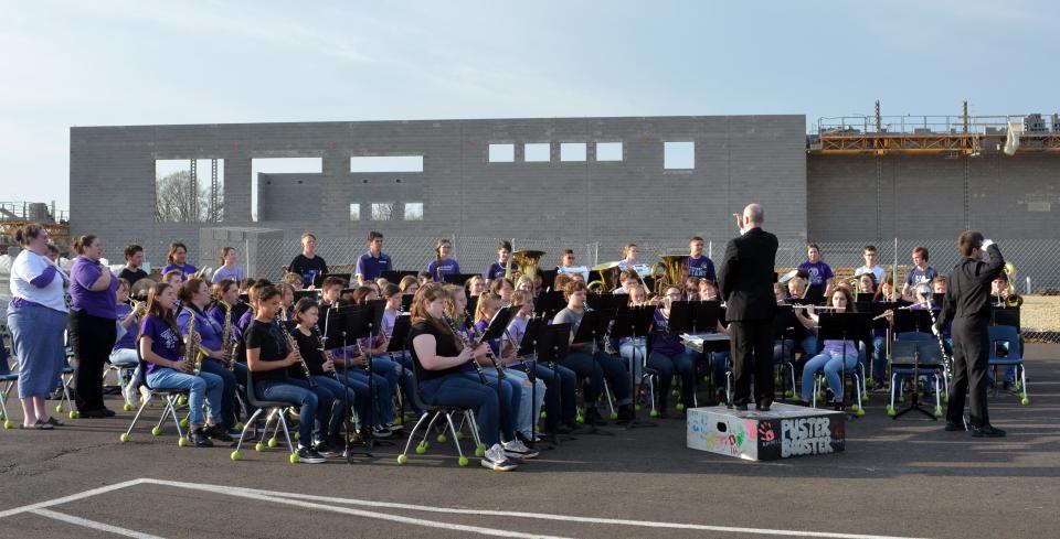 The Triway High School band performs April 20 during a groundbreaking ceremony for a one-campus building project.