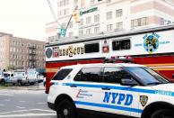 <p>Police and Fire Department vehicles line the streets after an incident in which a gunman fired shots inside the Bronx-Lebanon Hospital in New York City, June 30, 2017. (Brendan Mcdermid/Reuters) </p>