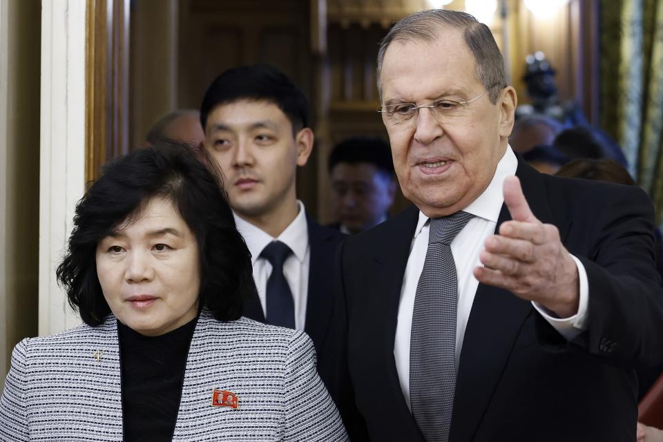 Russian Foreign Minister Sergey Lavrov, right, welcomes North Korean Foreign Minister Choe Son Hui for their talks in Moscow, Russia, Tuesday, Jan. 16, 2024. (Maxim Shemetov/Pool Photo via AP)