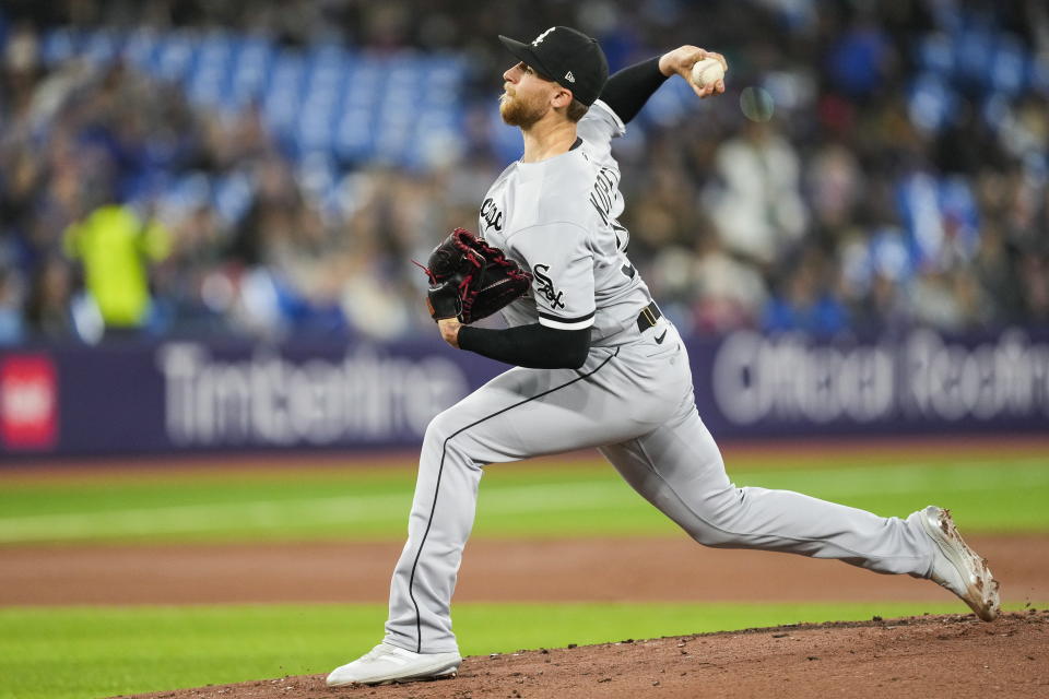 Chicago White Sox starting pitcher Michael Kopech (34) throws against the Toronto Blue Jays during the first inning of a baseball game in Toronto, Wednesday, April 26, 2023. (Andrew Lahodynskyj/The Canadian Press via AP)