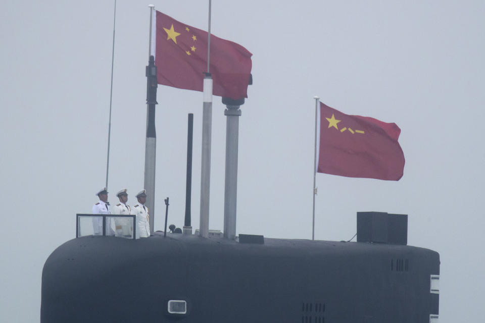 In this April 23, 2019, file photo, a new type 094A Jin-class nuclear submarine Long March 10 of the Chinese People's Liberation Army (PLA) Navy participates in a naval parade to commemorate the 70th anniversary of the founding of China's PLA Navy in the sea near Qingdao in eastern China's Shandong province. (AP Photo/Mark Schiefelbein, Pool, File)