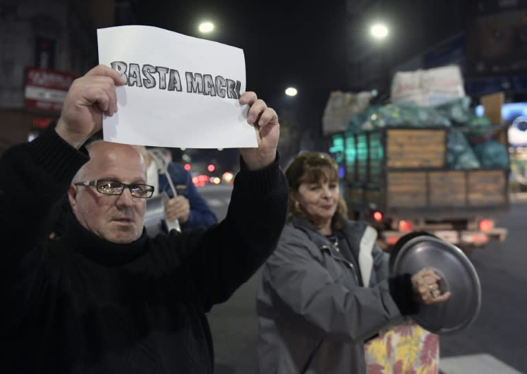 People bang pans during a protest September 3, 2018 in Buenos Aires against Argentine President Mauricio Macri's austerity policies