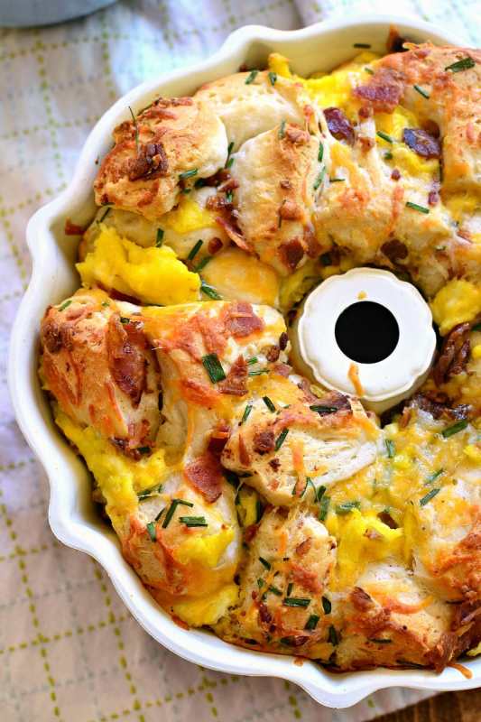 <p>This bacon, egg and cheese monkey bread combines all your breakfast favorites in one delicious pull-apart bread! Perfect for breakfast or an easy weeknight dinner, and just in time for back to school!</p><p><a href="http://www.lemontreedwelling.com/2016/08/bacon-egg-cheese-monkey-bread.html" rel="nofollow noopener" target="_blank" data-ylk="slk:Get the recipe here!;elm:context_link;itc:0;sec:content-canvas" class="link "><em><strong>Get the recipe here!</strong></em></a></p>