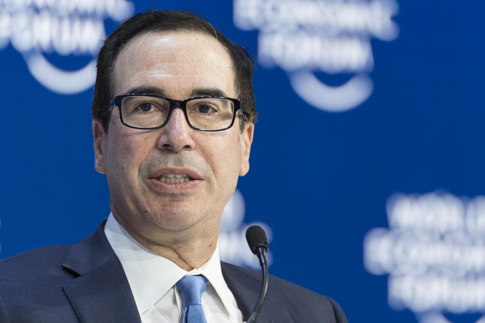 Steven Mnuchin, Secretary of the Treasury of the United States addresses a plenary session on the final day of the 50th annual meeting of the World Economic Forum, WEF, in Davos, Switzerland, Friday, Jan. 24, 2020. The meeting brings together entrepreneurs, scientists, corporate and political leaders in Davos from January 21 to 24. (Alessandro della Valle/Keystone via AP)