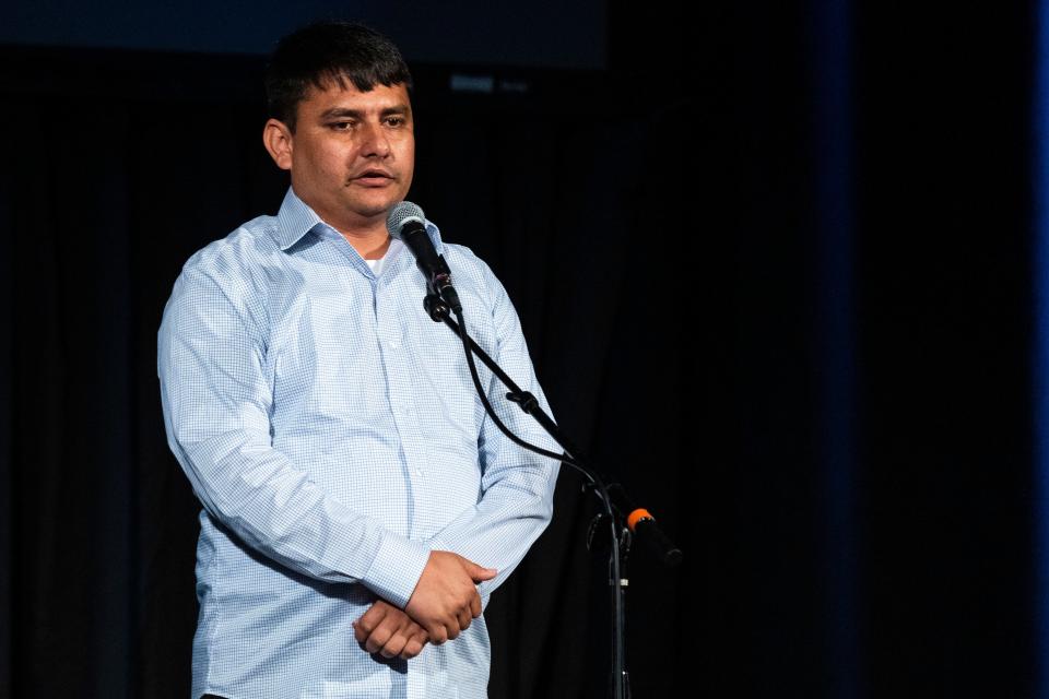 Shir Agha Safi tells a story during the Des Moines Storytellers Project's "Travel" show at Hoyt Sherman Place on Tuesday, June 20, 2023, in Des Moines.