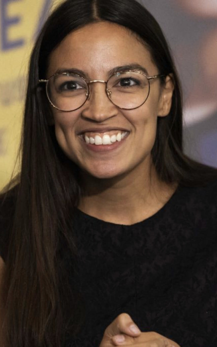 Ocasio-Cortez at a campaign rally in 2018