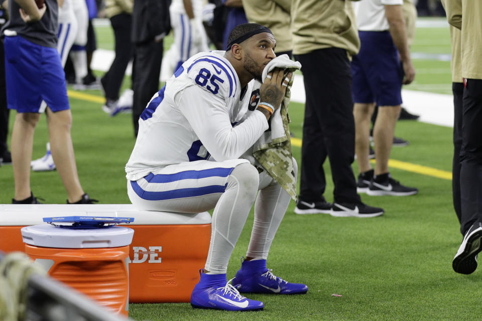 FILE - In this Nov. 21, 2019, file photo, Indianapolis Colts tight end Eric Ebron (85) sits on the side lines during the final moments of the second half of an NFL football game against the Houston Texans in Houston. Ebron is embracing a fresh start in Pittsburgh after an ugly divorce with the Indianapolis Colts. The Steelers signed Ebron to a two-year contract last week. (AP Photo/Mike Marshall, File)