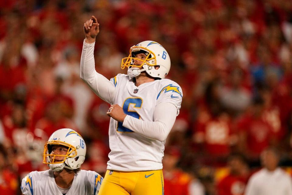 Los Angeles Chargers place kicker Dustin Hopkins watches his field goal against the Kansas City Chiefs on Sept. 15, 2022, in Kansas City, Mo.