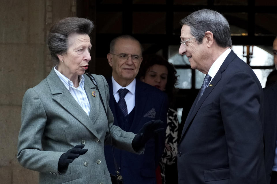 Cyprus' President Nicos Anastasiades and Britain's Princess Anne, left, talk after their meeting at the presidential palace in Nicosia, Cyprus, Wednesday, Jan. 11, 2023. Princess Anne visited British soldiers serving with a United Nations peacekeeping force on ethnically divided Cyprus. (AP Photo/Petros Karadjias)