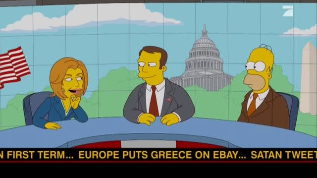 FOX Homer (right) talking to newscasters in 'Politically Inept, With Homer Simpson'