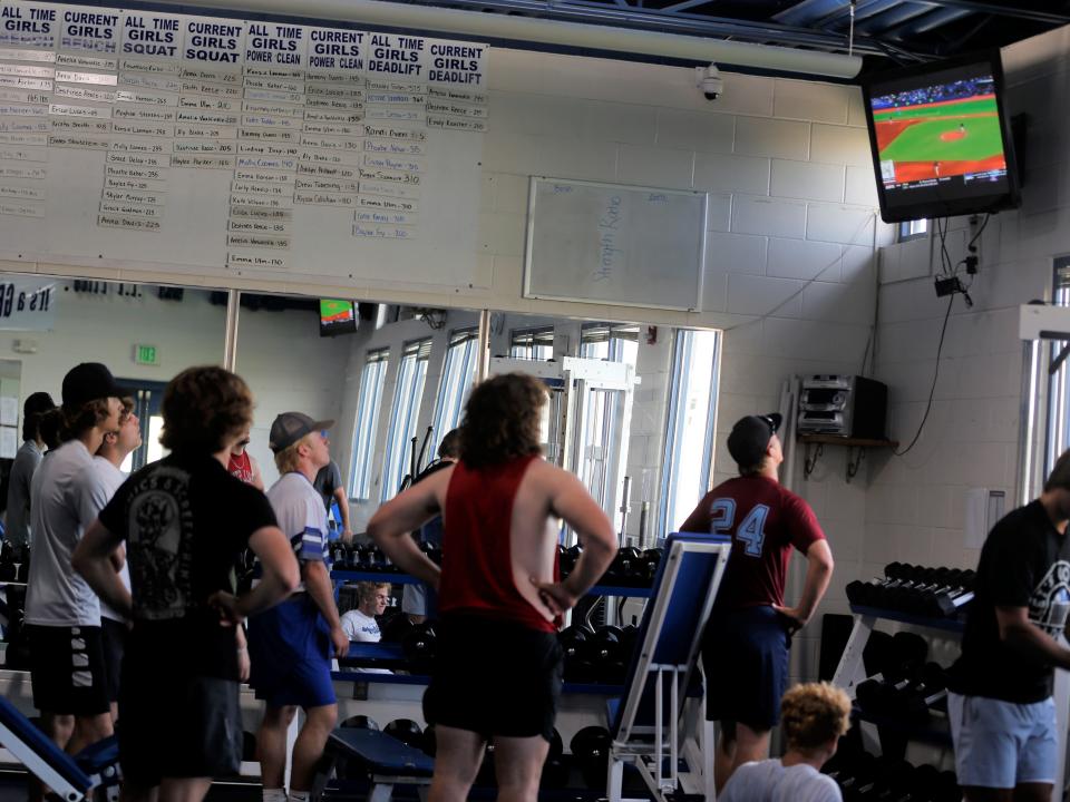 Centerville baseball players stop their workout to watch the SportsCenter Top 10 Plays June 15, 2022.
