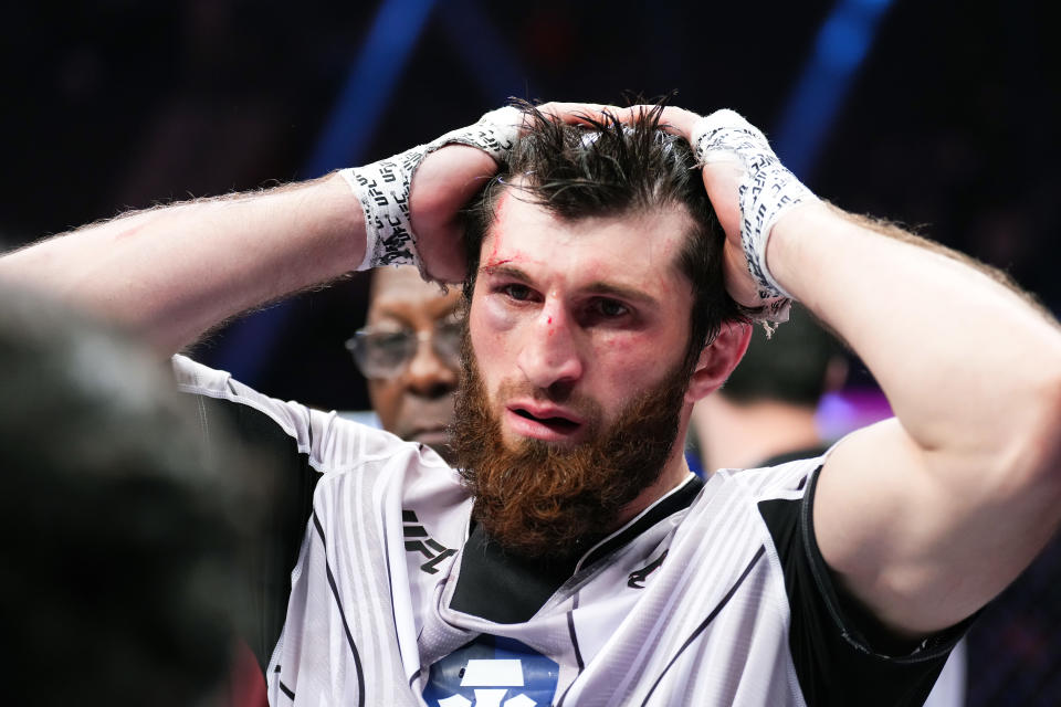 LAS VEGAS, NEVADA - DECEMBER 10: Magomed Ankalaev of Russia reacts after his split draw decision against Jan Blachowicz of Poland in their UFC light heavyweight championship fight during the UFC 282 event at T-Mobile Arena on December 10, 2022 in Las Vegas, Nevada. (Photo by Chris Unger/Zuffa LLC)