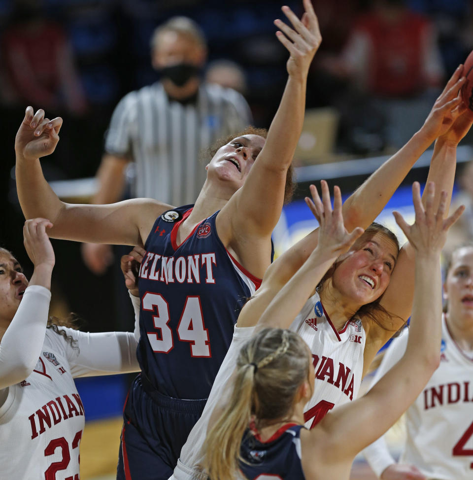 Belmont forward Cam Browning (34) fights Indiana guard Ali Patberg (14) for a rebound during the first half of a college basketball game in the second round of the NCAA women's tournament at Greehey Arena in San Antonio on Wednesday, March 24, 2021. (AP Photo/Ronald Cortes)