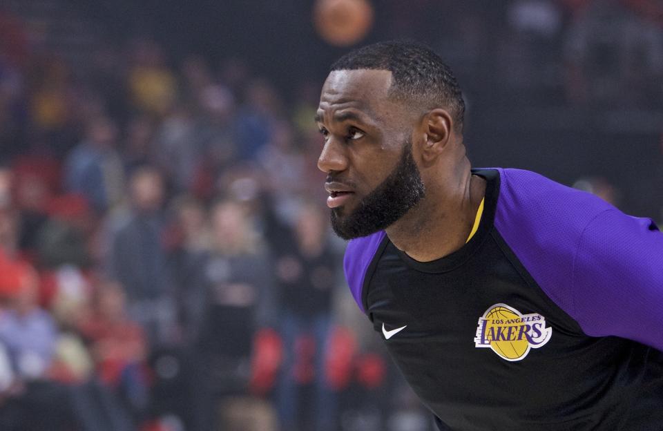 Los Angeles Lakers forward LeBron James partakes in warm ups before an NBA basketball game against the Portland Trail Blazers in Portland, Ore., Thursday, Oct. 18, 2018. (AP Photo/Craig Mitchelldyer)