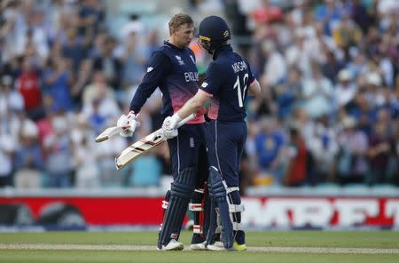 Britain Cricket - England v Bangladesh - 2017 ICC Champions Trophy Group A - The Oval - 1/6/17 England's Joe Root and Eoin Morgan celebrate at the end of the match Action Images via Reuters / Paul Childs Livepic EDITORIAL USE ONLY. - RTX38KUY