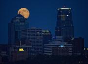 The Supermoon rises over downtown Kansas City, Missouri July 12, 2014. Occurring when a full moon or new moon coincides with the closest approach the moon makes to the Earth, the Supermoon results in a larger-than-usual appearance of the lunar disk.